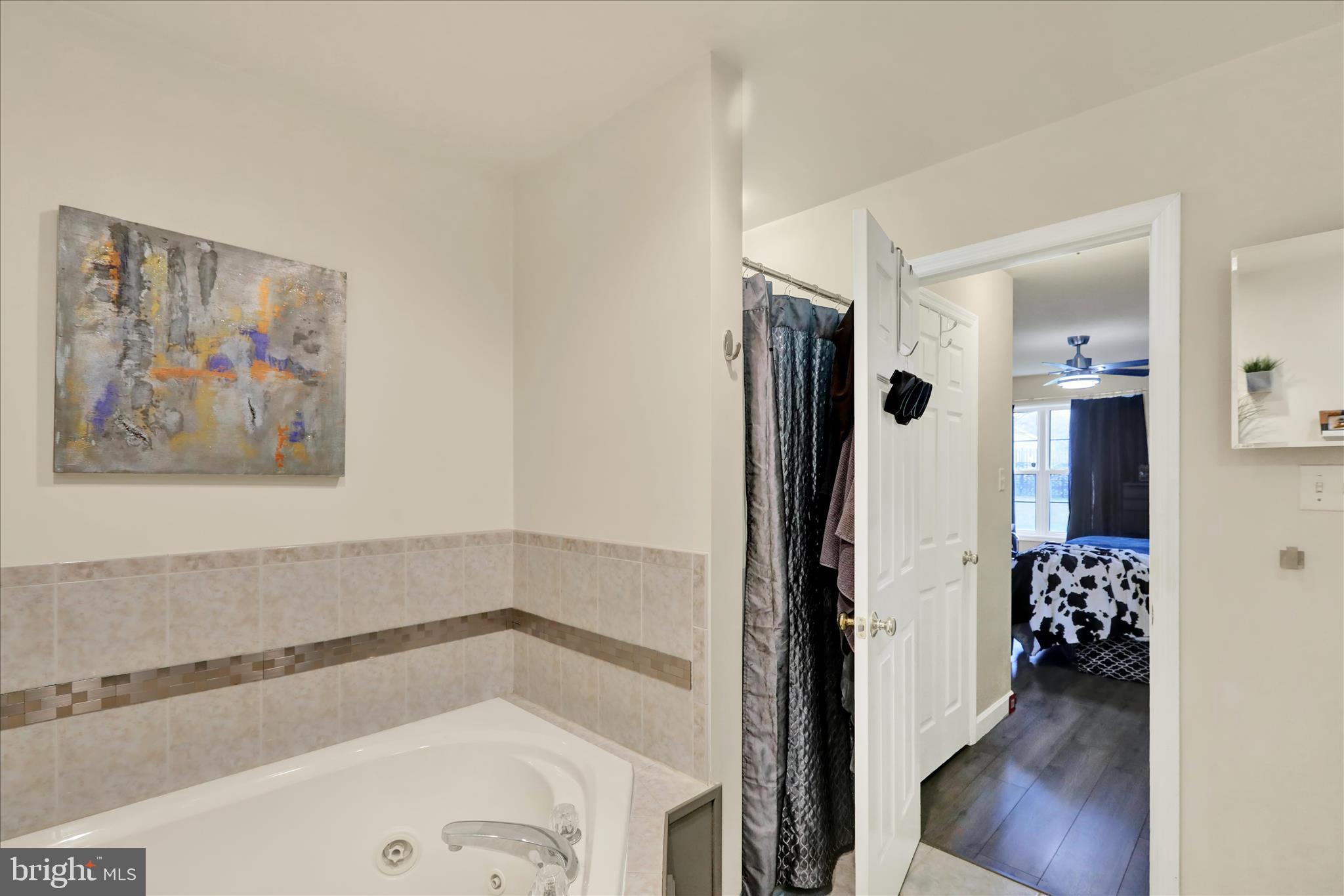 73 Michigan Drive Reading, PA 19608 - Photo 13 of 42 a bathroom with a tub and shower