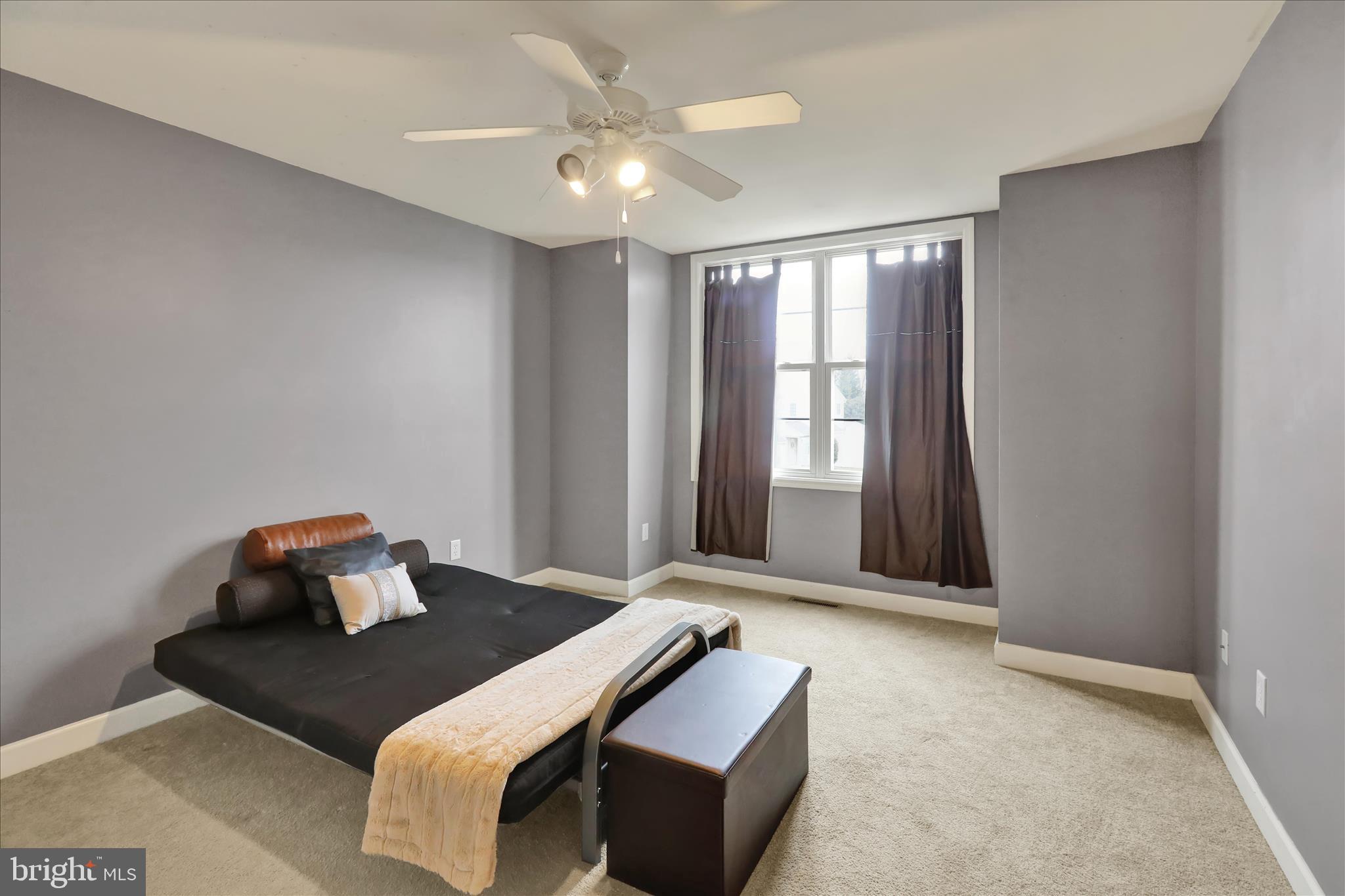 73 Michigan Drive Reading, PA 19608 - Photo 27 of 42 a bedroom with a bed and a window