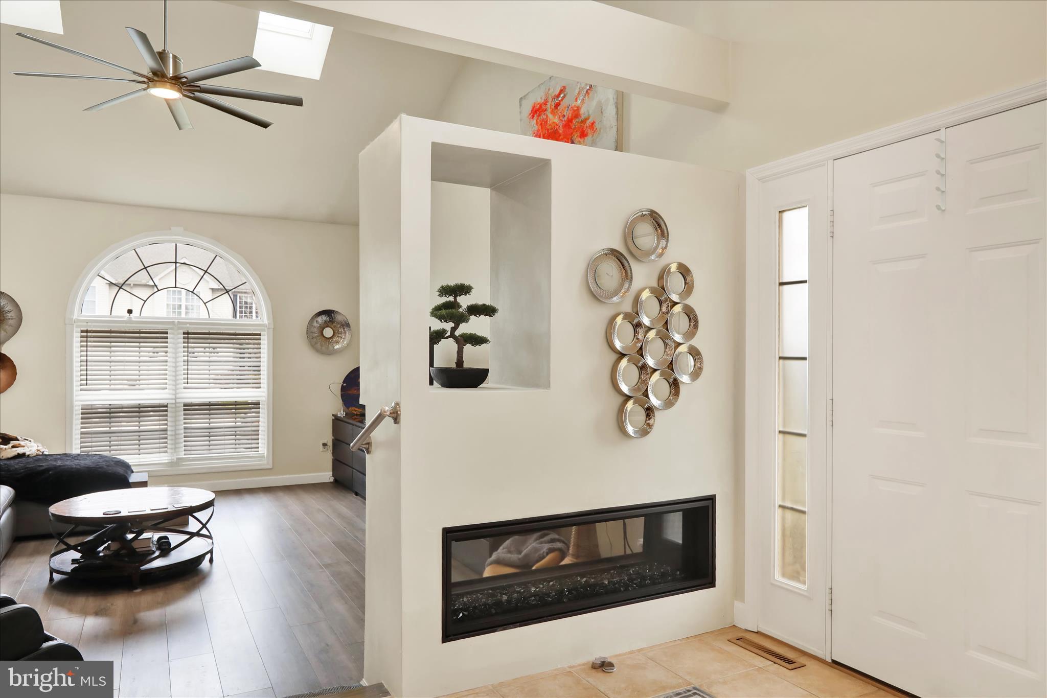 73 Michigan Drive Reading, PA 19608 - Photo 3 of 42 a living room with furniture and a fireplace
