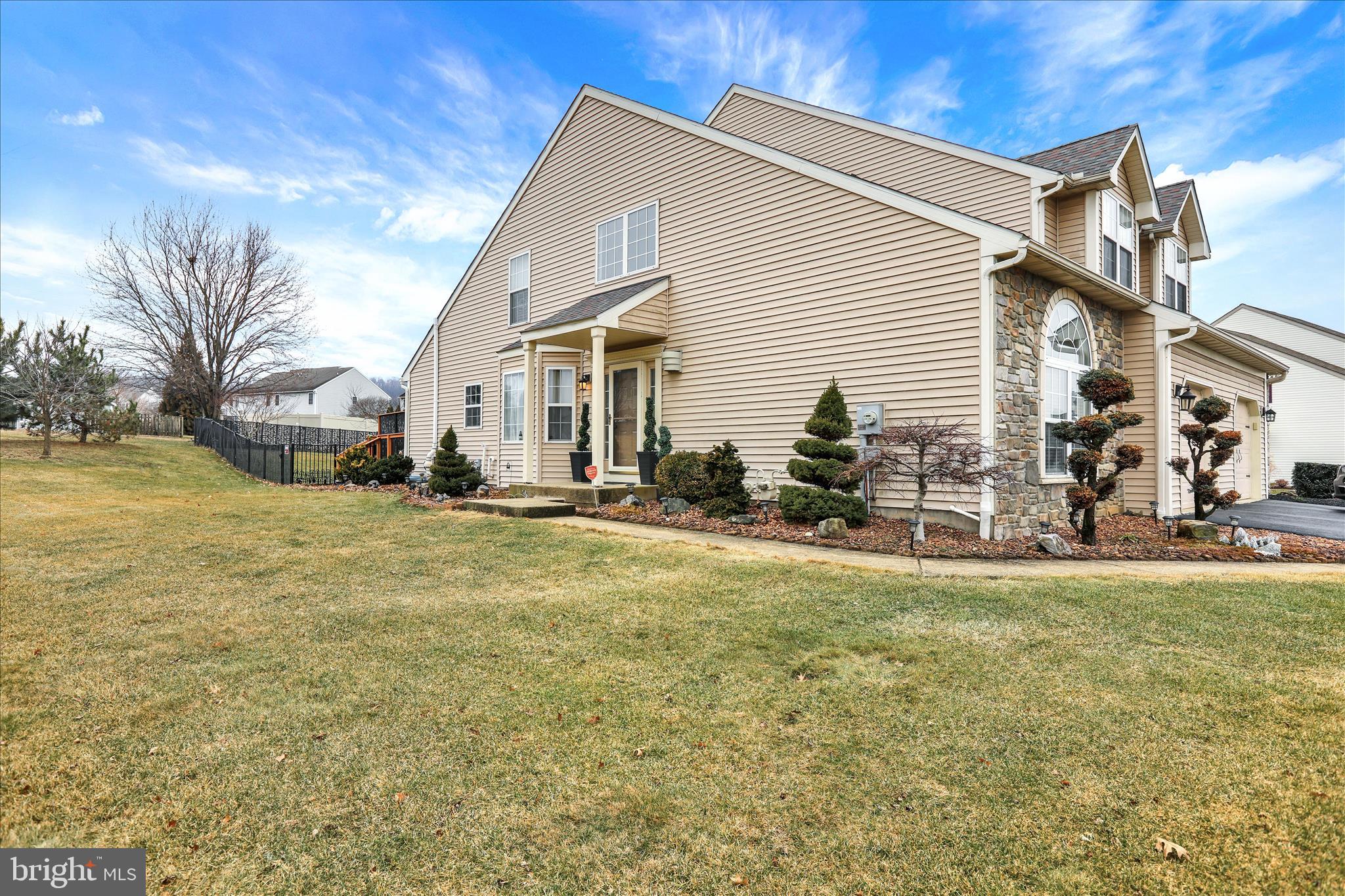 73 Michigan Drive Reading, PA 19608 - Photo 33 of 42 a view of a house with a yard and sitting area