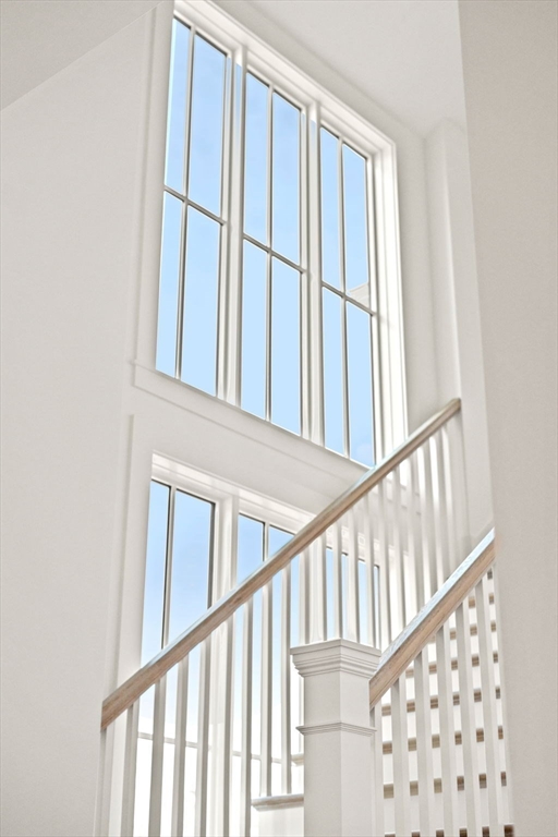 1060 Grove Street, Unit LOT 23 Framingham, MA 01701 - Photo 2 of 15 a view of staircase with railing and a stairs