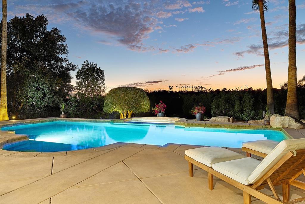2869 Dos Lomas Place Fallbrook, CA 92028 - Photo 11 of 55 a view of a backyard with swimming pool and trees