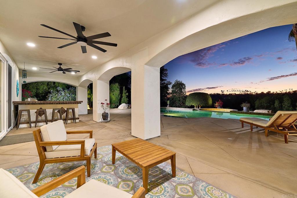 2869 Dos Lomas Place Fallbrook, CA 92028 - Photo 12 of 55 a outdoor space with lots of chairs and a potted plant