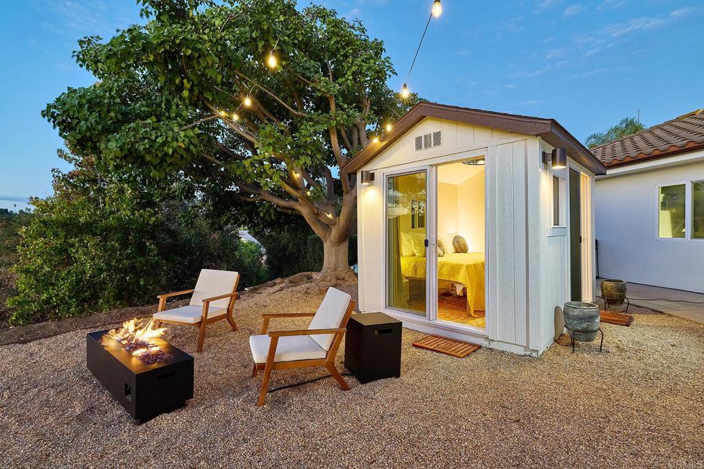 2869 Dos Lomas Place Fallbrook, CA 92028 - Photo 13 of 55 a backyard of a house with yard and outdoor seating