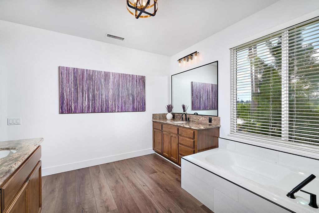 2869 Dos Lomas Place Fallbrook, CA 92028 - Photo 31 of 55 a room with a large window and kitchen island