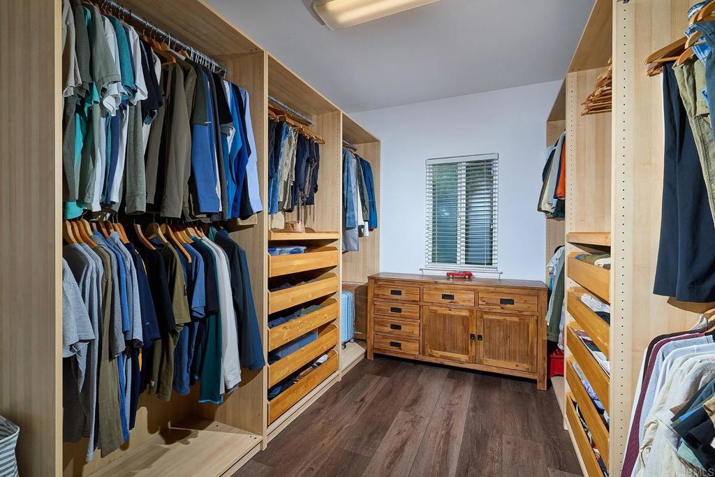 2869 Dos Lomas Place Fallbrook, CA 92028 - Photo 32 of 55 a view of walk in closet with clothes and shoes