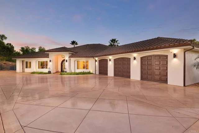 a view of a house with a garage