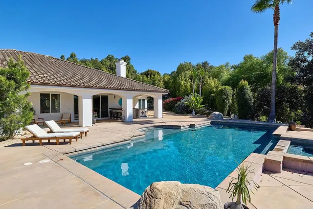 a outdoor living space with furniture and a potted plant