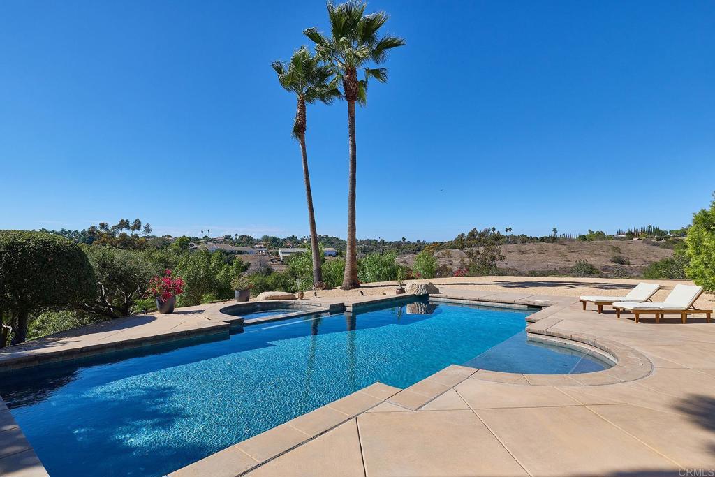 2869 Dos Lomas Place Fallbrook, CA 92028 - Photo 46 of 55 a view of a terrace with a garden