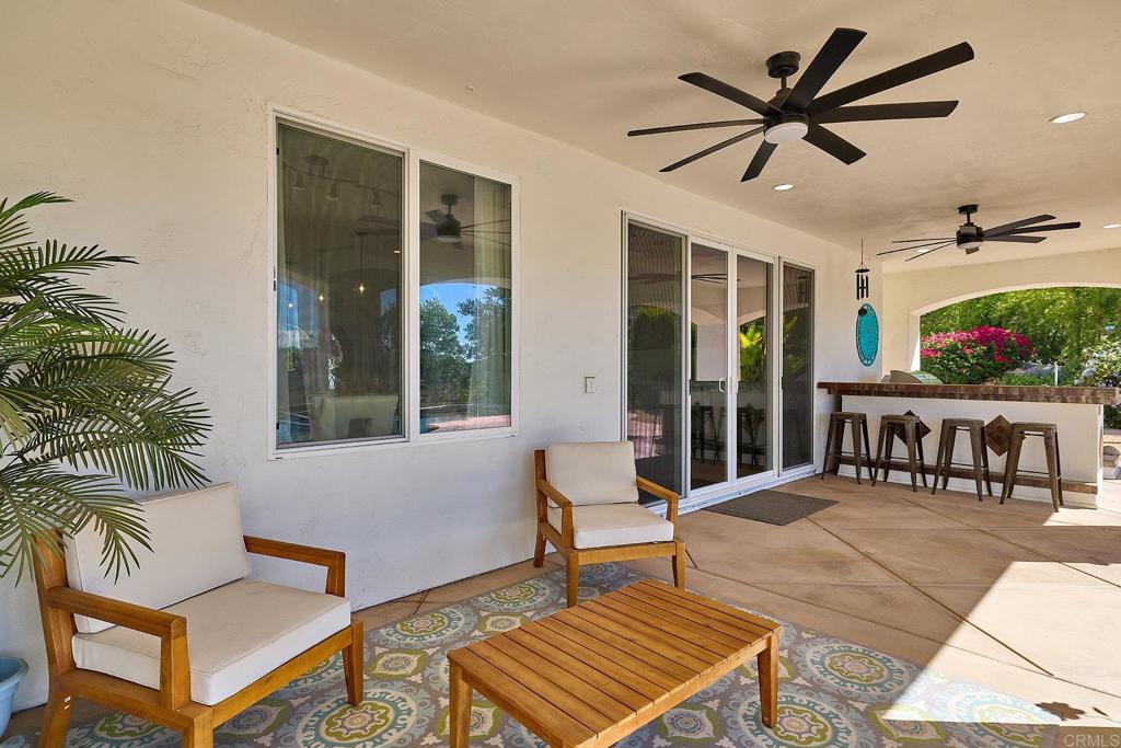 2869 Dos Lomas Place Fallbrook, CA 92028 - Photo 47 of 55 a outdoor living space with furniture and a potted plant