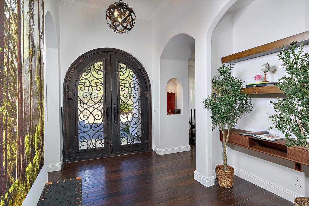 2869 Dos Lomas Place Fallbrook, CA 92028 - Photo 8 of 55 a view of hall way with furniture and a potted plant