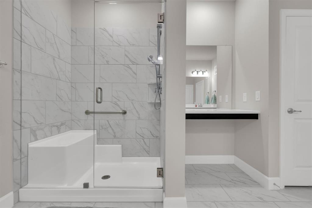 651 Watters Road, Unit 2105 Allen, TX 75013 - Photo 24 of 32 a bathroom with a bathtub
