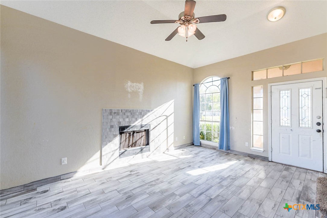 2305 Fieldstone Drive Killeen, TX 76549 - Photo 5 of 18 a view of empty room with wooden floor and fan
