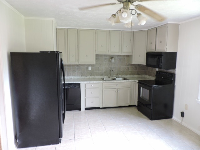 828 Augusta Farms Road Waynesboro, VA 22980 - Photo 6 of 14 a kitchen with a sink and cabinets