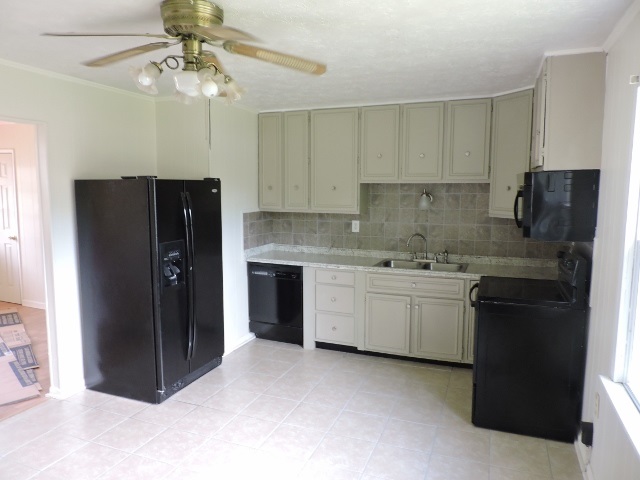 828 Augusta Farms Road Waynesboro, VA 22980 - Photo 7 of 14 a kitchen with a refrigerator a sink and dishwasher