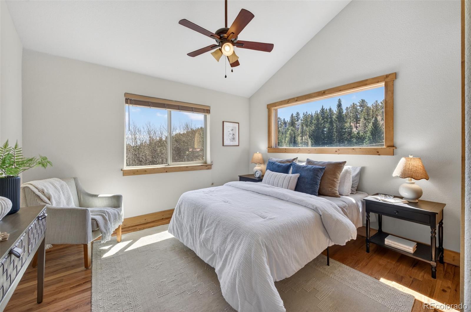 1328 Clark Road Bailey, CO 80421 - Photo 19 of 48 a bedroom with bed and a window
