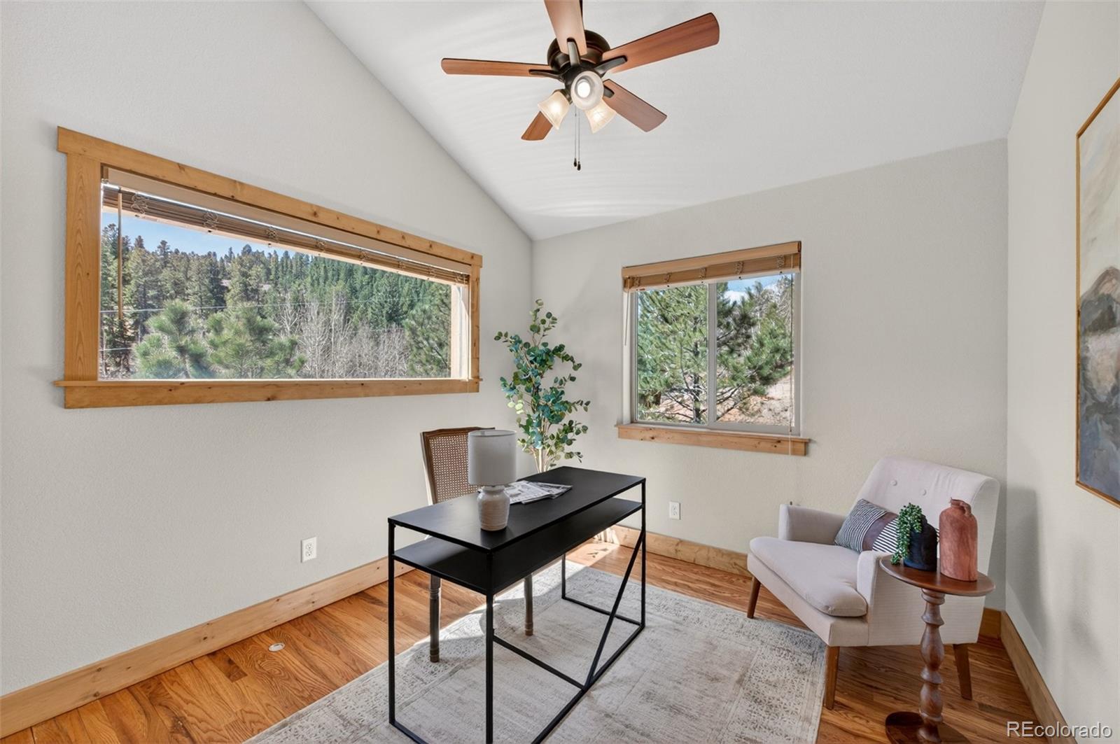 1328 Clark Road Bailey, CO 80421 - Photo 22 of 48 a workspace with furniture and a window