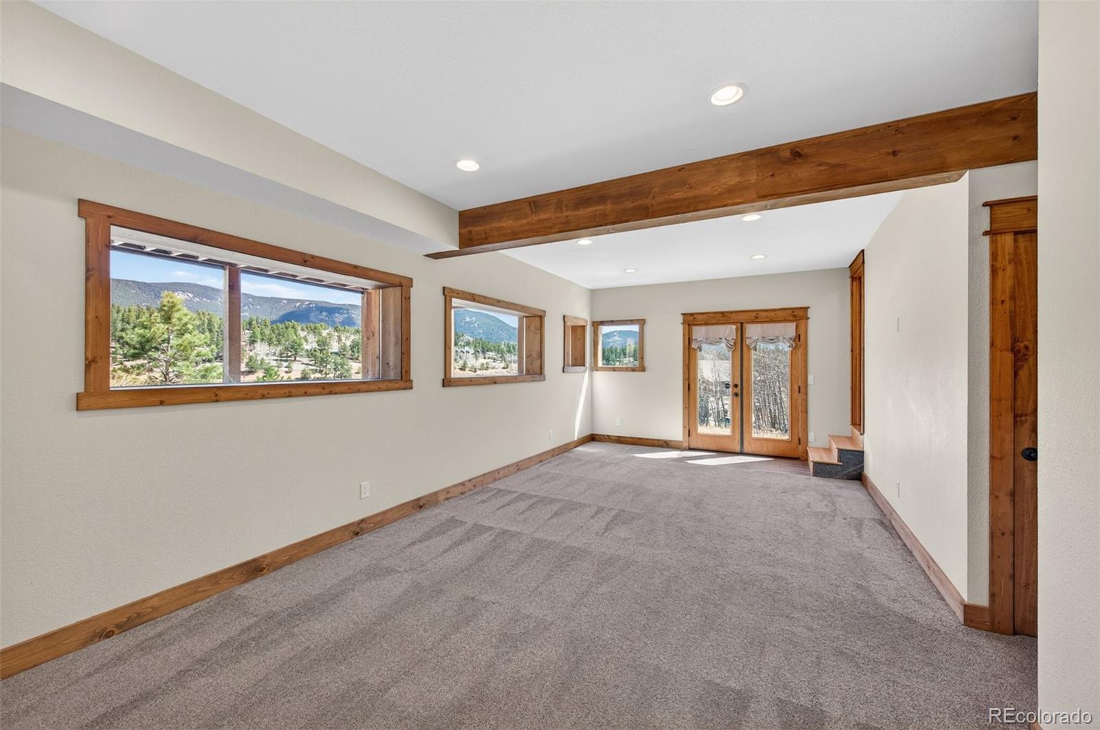 1328 Clark Road Bailey, CO 80421 - Photo 26 of 48 a view of an empty room with a window