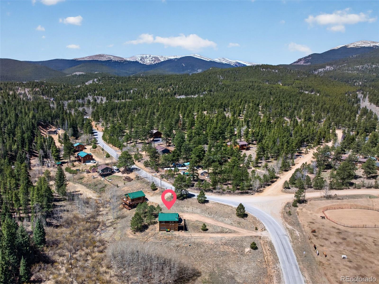 1328 Clark Road Bailey, CO 80421 - Photo 39 of 48 a view of a town with mountains in the background