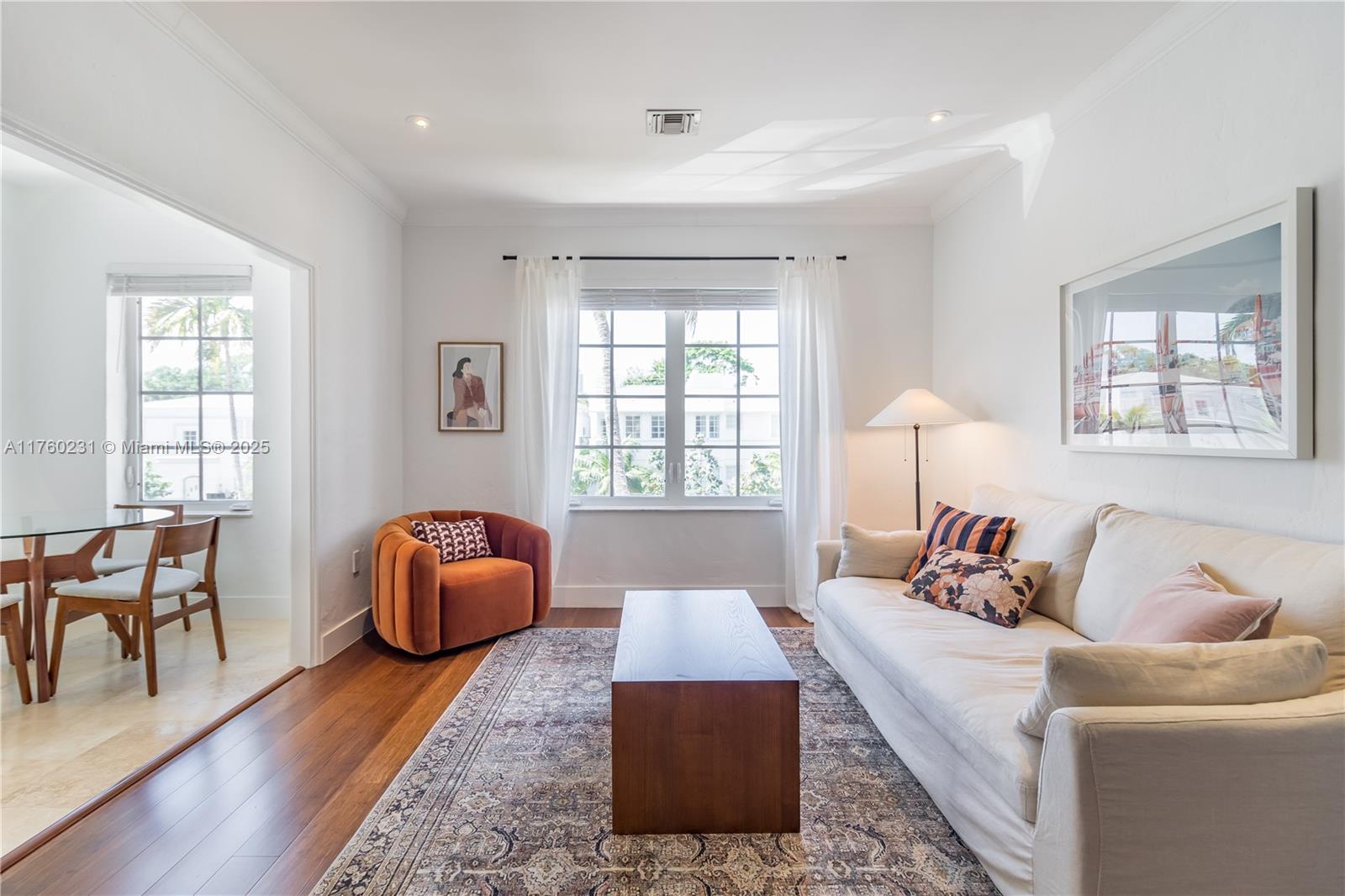 1569 Euclid Avenue, Unit 3 Miami Beach, FL 33139 - Photo 12 of 20 a living room with furniture and a window
