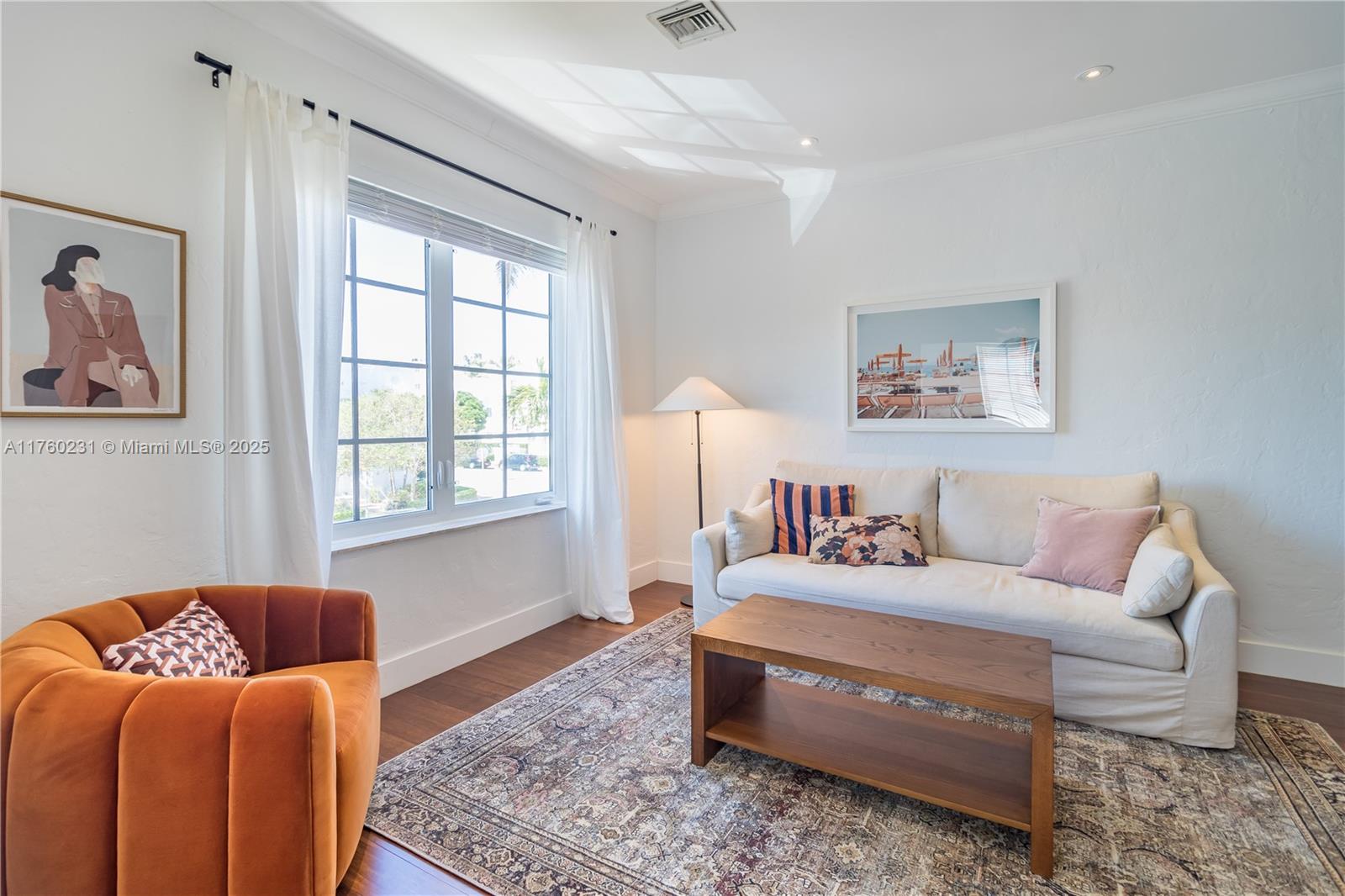 1569 Euclid Avenue, Unit 3 Miami Beach, FL 33139 - Photo 14 of 20 a bedroom with a bed and a couch