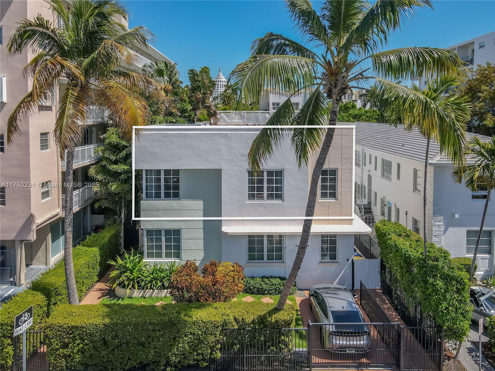 1569 Euclid Avenue, Unit 3 Miami Beach, FL 33139 - Photo 5 of 20 front view of a house with a yard