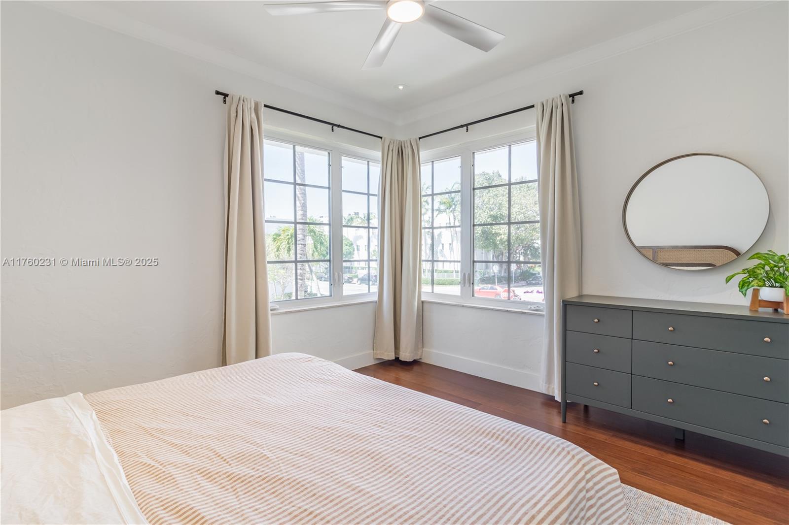 1569 Euclid Avenue, Unit 3 Miami Beach, FL 33139 - Photo 9 of 20 a bedroom with a bed and a dresser