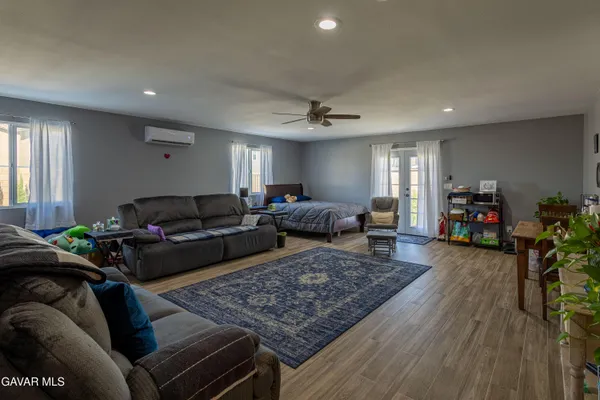 a living room with furniture and a couch