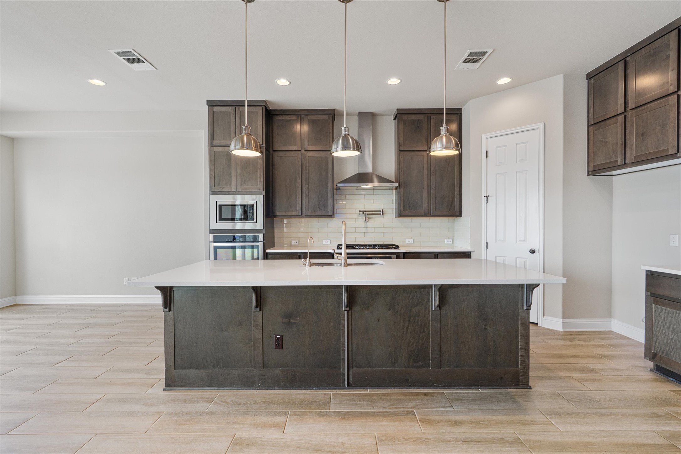 622 Cheyenne Lane Cedar Park, TX 78613 - Photo 8 of 40 The large island is the natural spot for morning coffee or casual weeknight tacos, keeping the chef part of the conversation