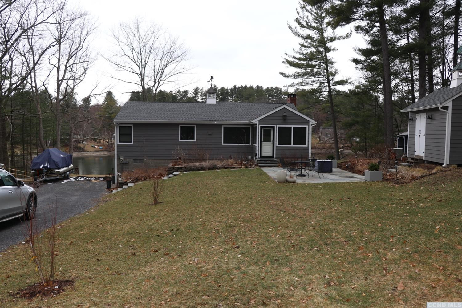 1238 Lakeview Road Copake, NY 12516 - Photo 1 of 54 a front view of a house with garden