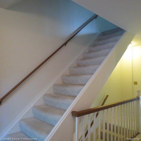 643 Oakbrook West, Unit 23 Rochester, MI 48307 - Photo 13 of 24 Stairs to Upper Level