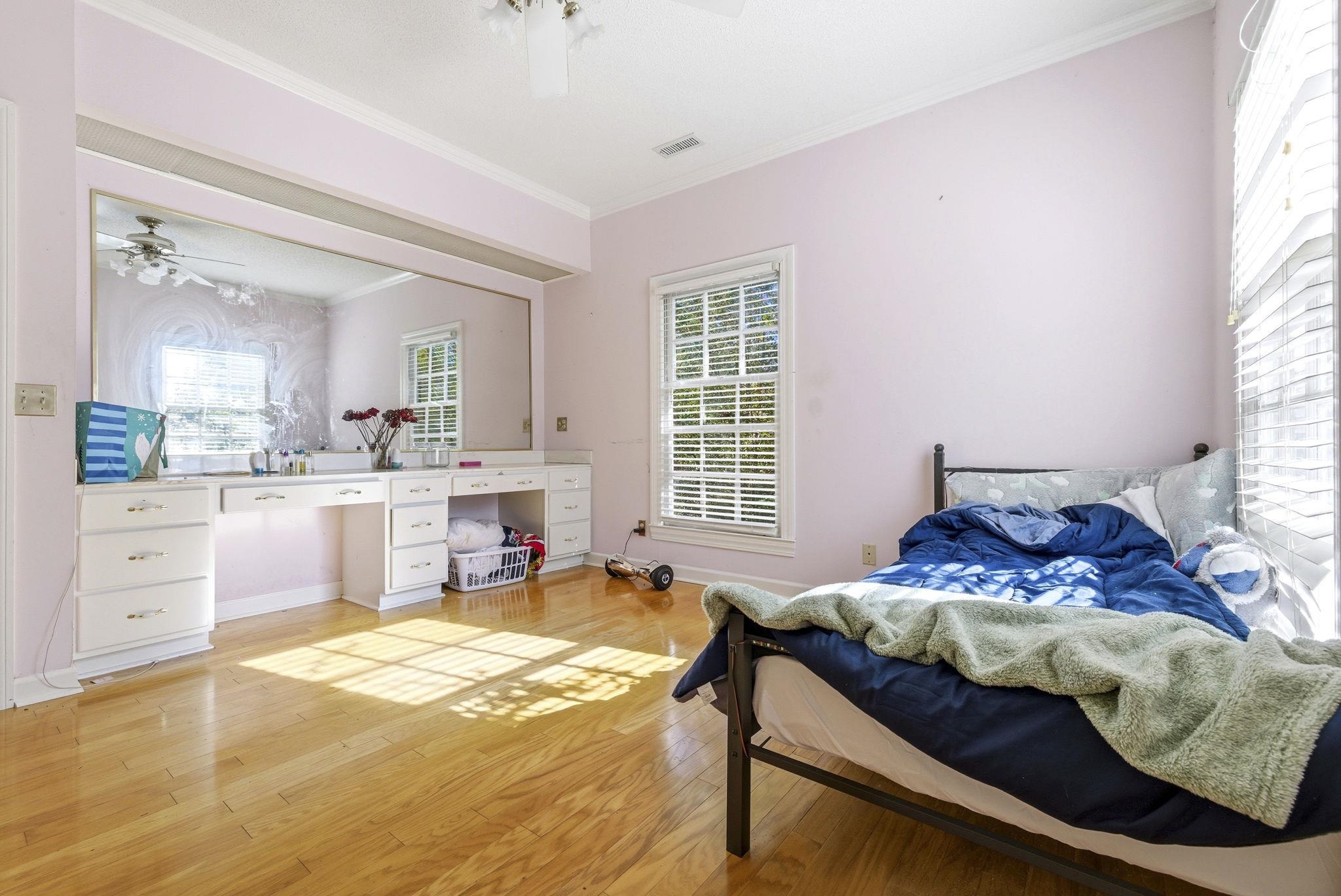 485 Carolina Drive Loris, SC 29569 - Photo 30 of 40 Bedroom with ornamental molding, light wood-style flooring, and ceiling fan