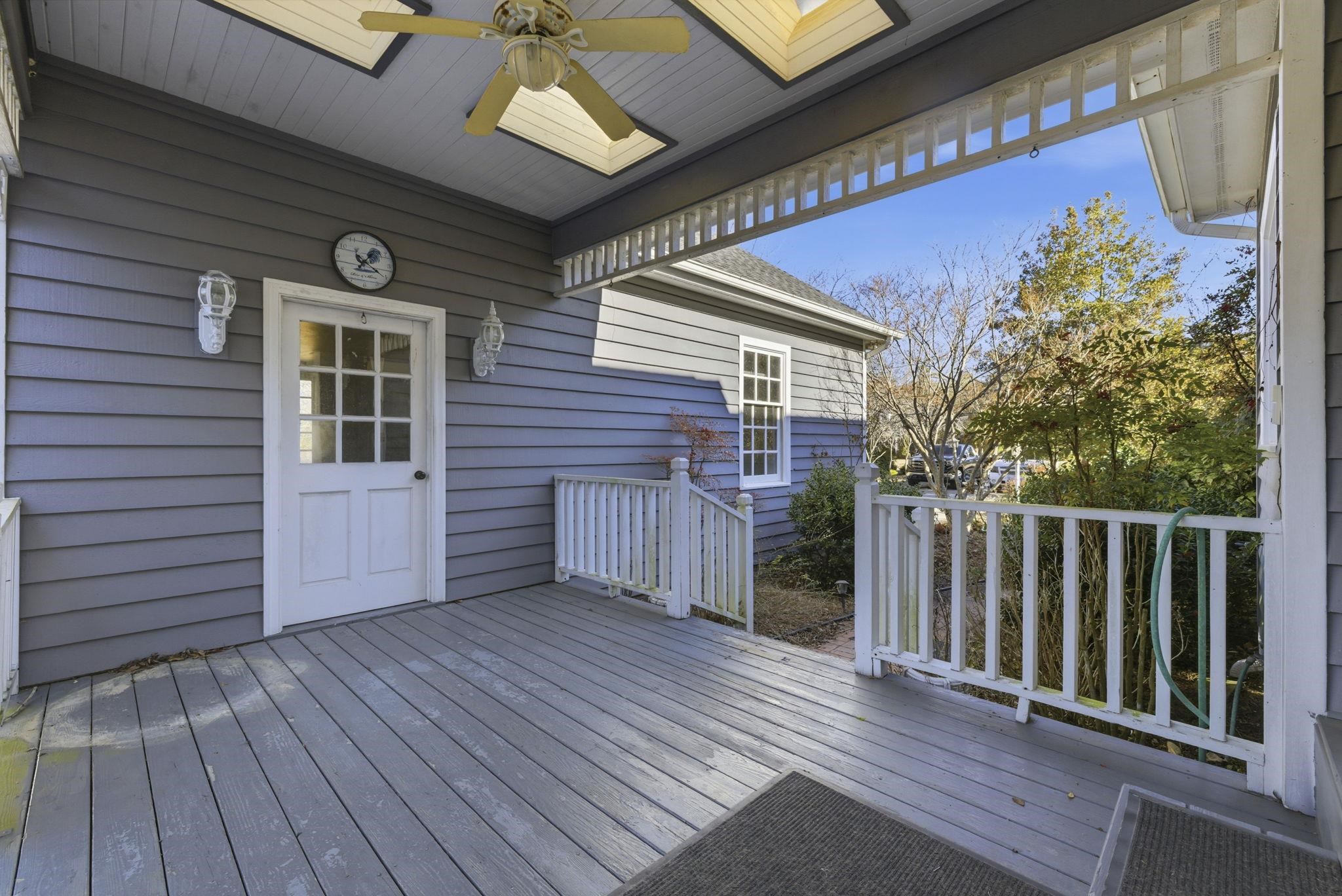 485 Carolina Drive Loris, SC 29569 - Photo 33 of 40 Wooden deck with ceiling fan