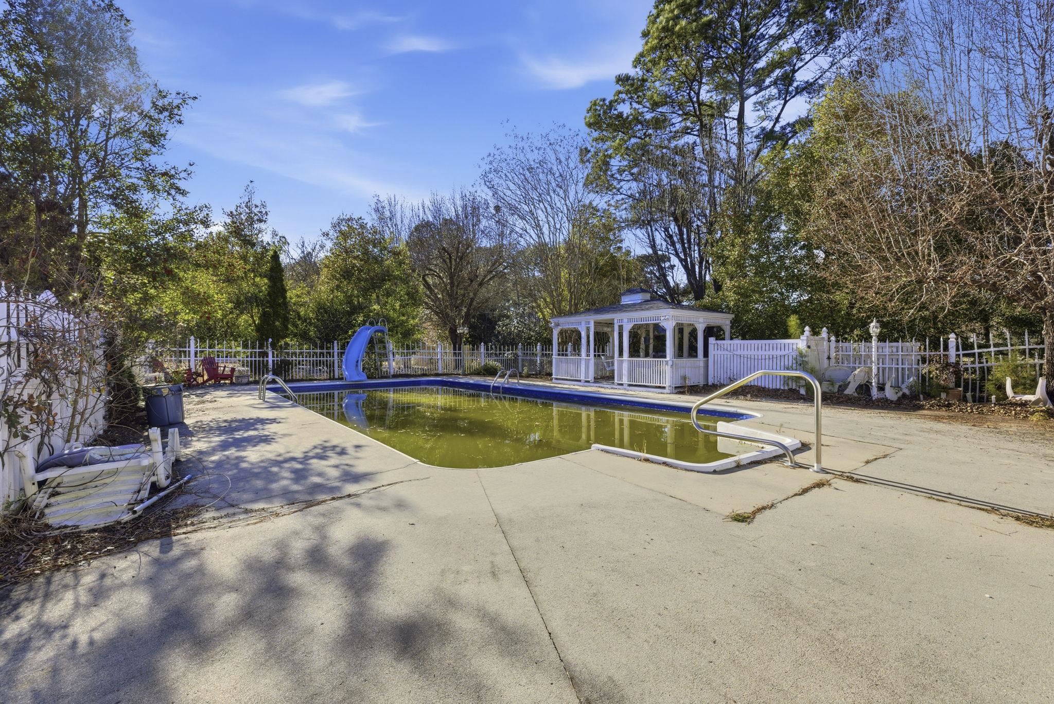 485 Carolina Drive Loris, SC 29569 - Photo 37 of 40 View of pool featuring a water slide and a gazebo