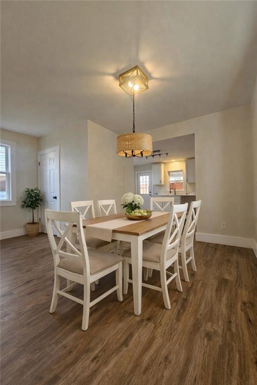 539 Walnut Street Vandergrift, PA 15690 - Photo 10 of 35 a view of a dining room with furniture wooden floor and chandelier