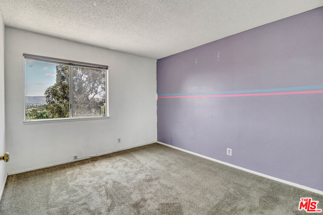 19630 Chalina Drive Walnut, CA 91789 - Photo 11 of 19 an empty room with a window