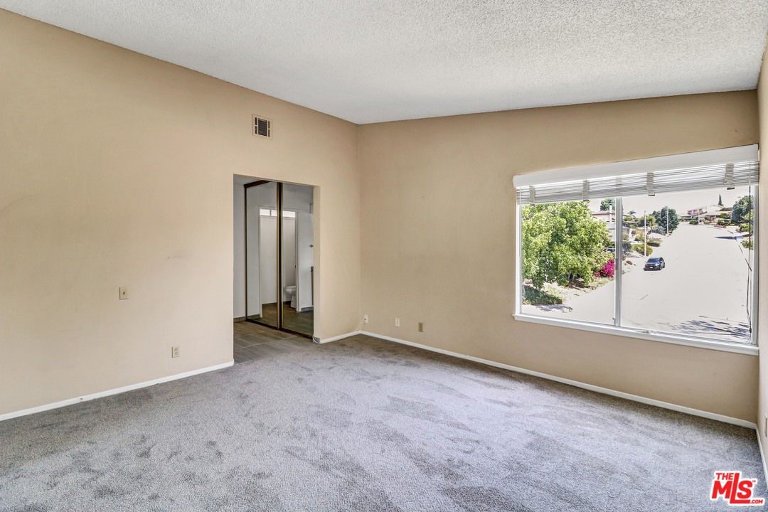 19630 Chalina Drive Walnut, CA 91789 - Photo 15 of 19 an empty room with a window