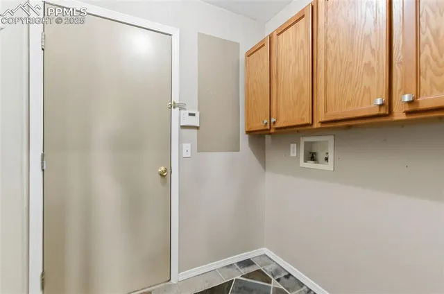 a view of walk in closet with window