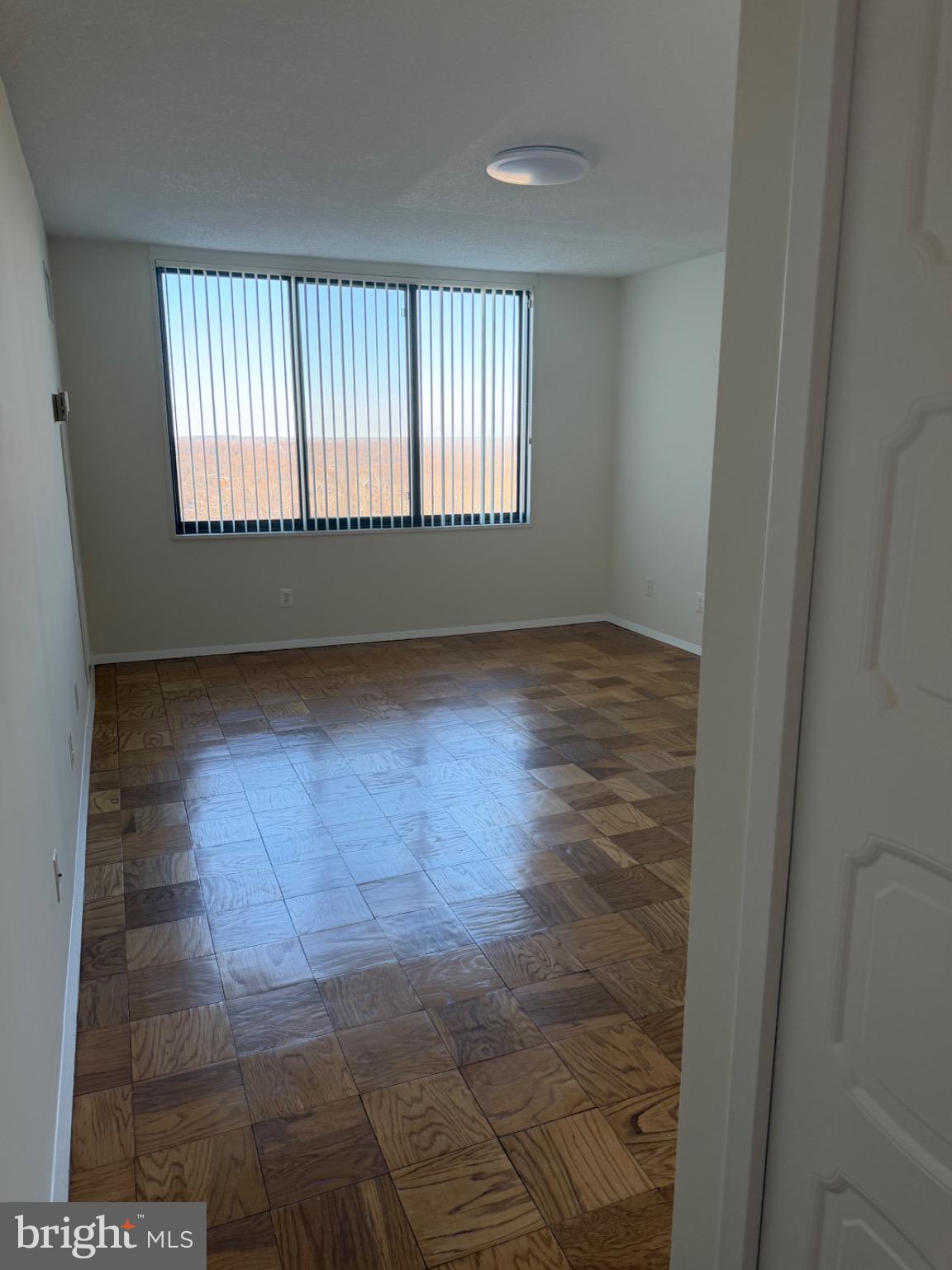 5225 Pooks Hill Road, Unit 1804N Bethesda, MD 20814 - Photo 14 of 44 a view of an empty room and window
