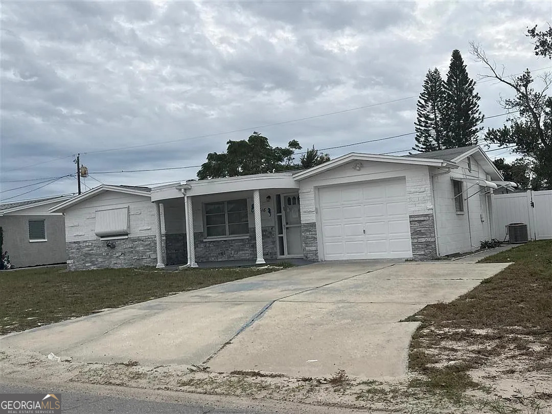 4816 Panorama Avenue Holiday, FL 34690 - Photo 3 of 5 a view of a house with a patio
