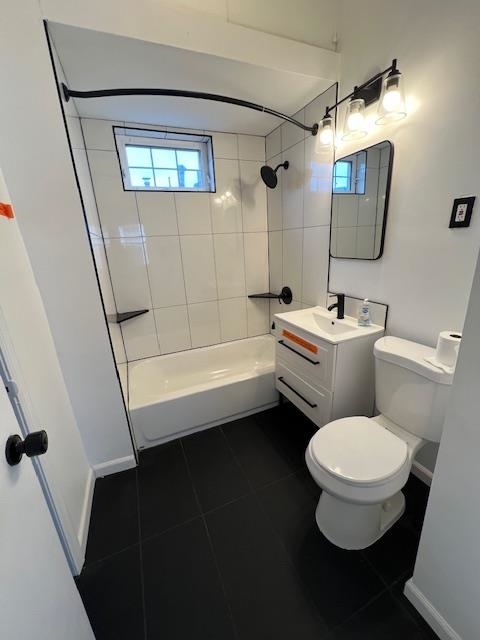 15 George Street, Unit 2 Bayonne, NJ 07002 - Photo 6 of 9 a bathroom with a toilet a sink and bathtub