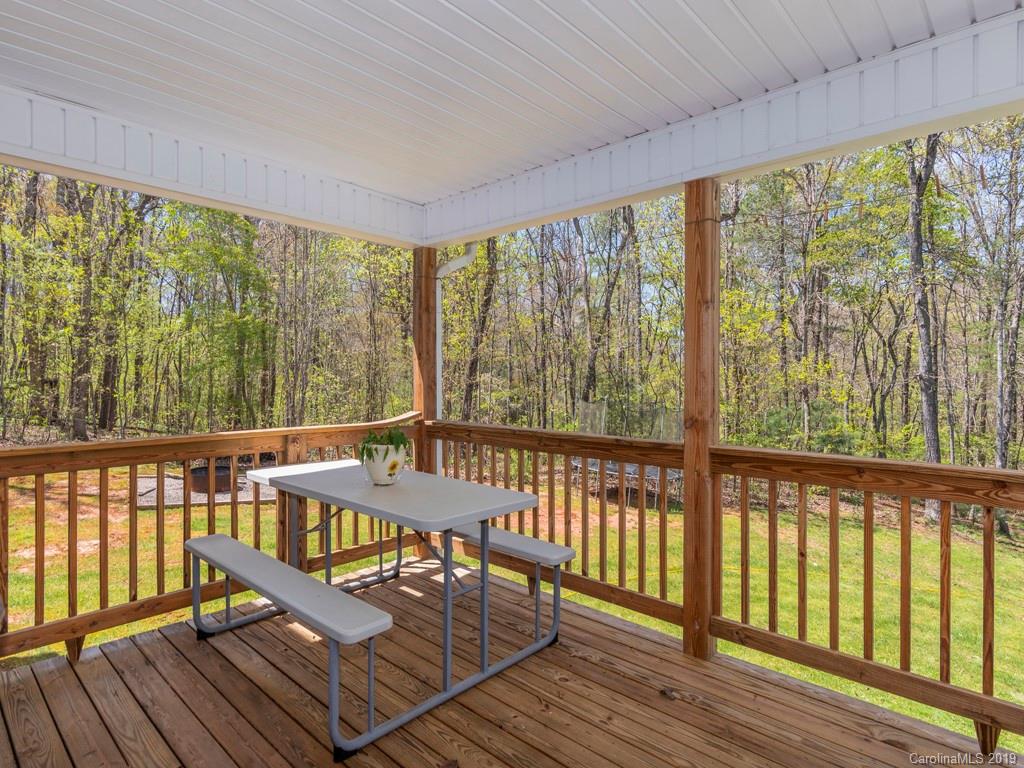 58 Thunder Ridge Road Canton, NC 28716 - Photo 18 of 26 a view of a two chairs in the balcony