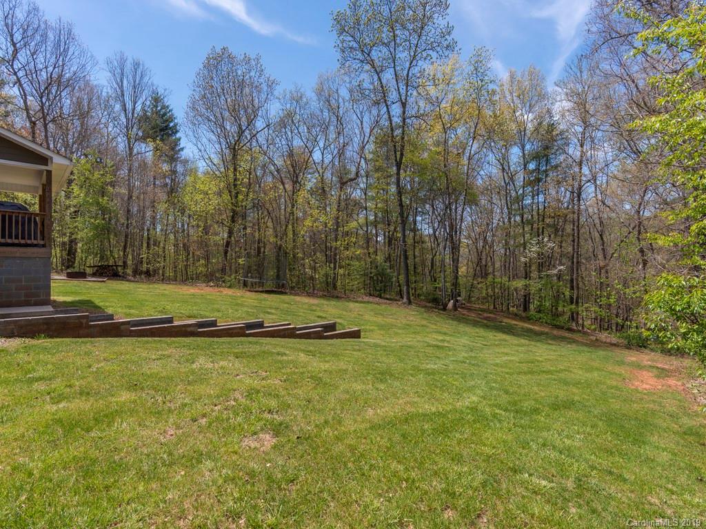 58 Thunder Ridge Road Canton, NC 28716 - Photo 21 of 26 a view of swimming pool with trees in the background