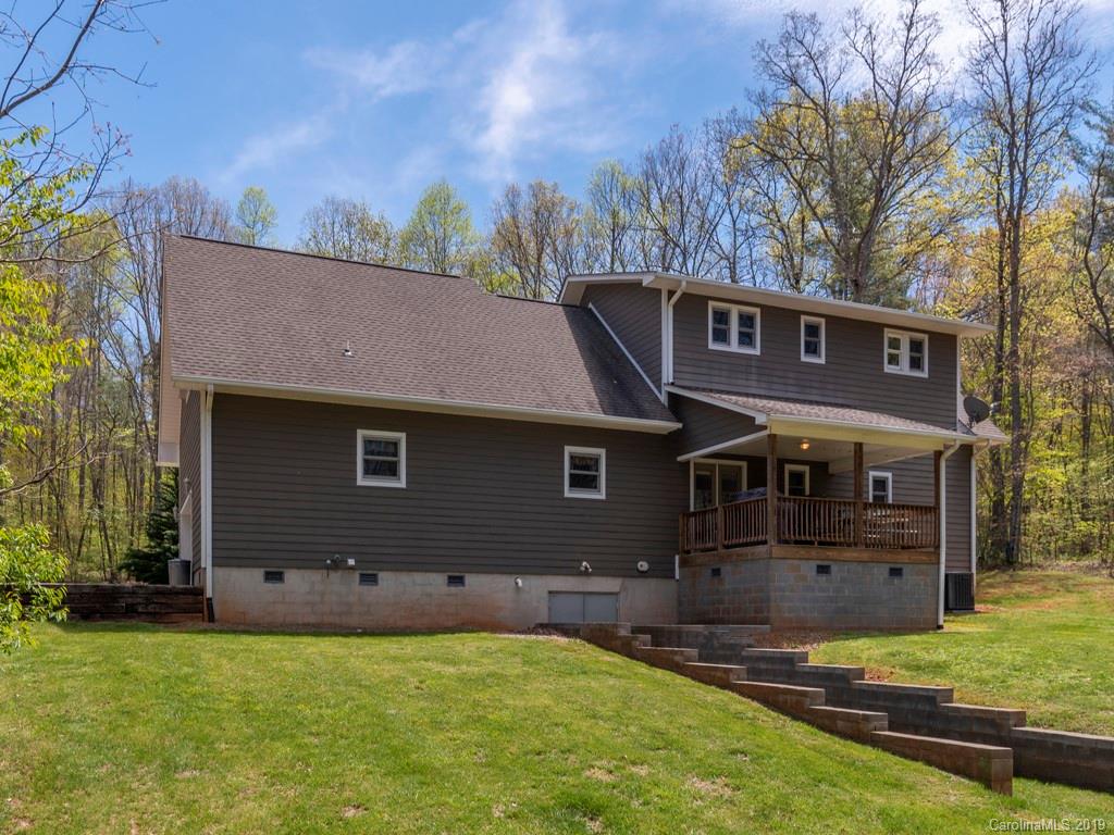 58 Thunder Ridge Road Canton, NC 28716 - Photo 22 of 26 a front view of a house with a yard