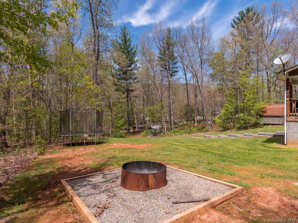 58 Thunder Ridge Road Canton, NC 28716 - Photo 23 of 26 a view of a backyard