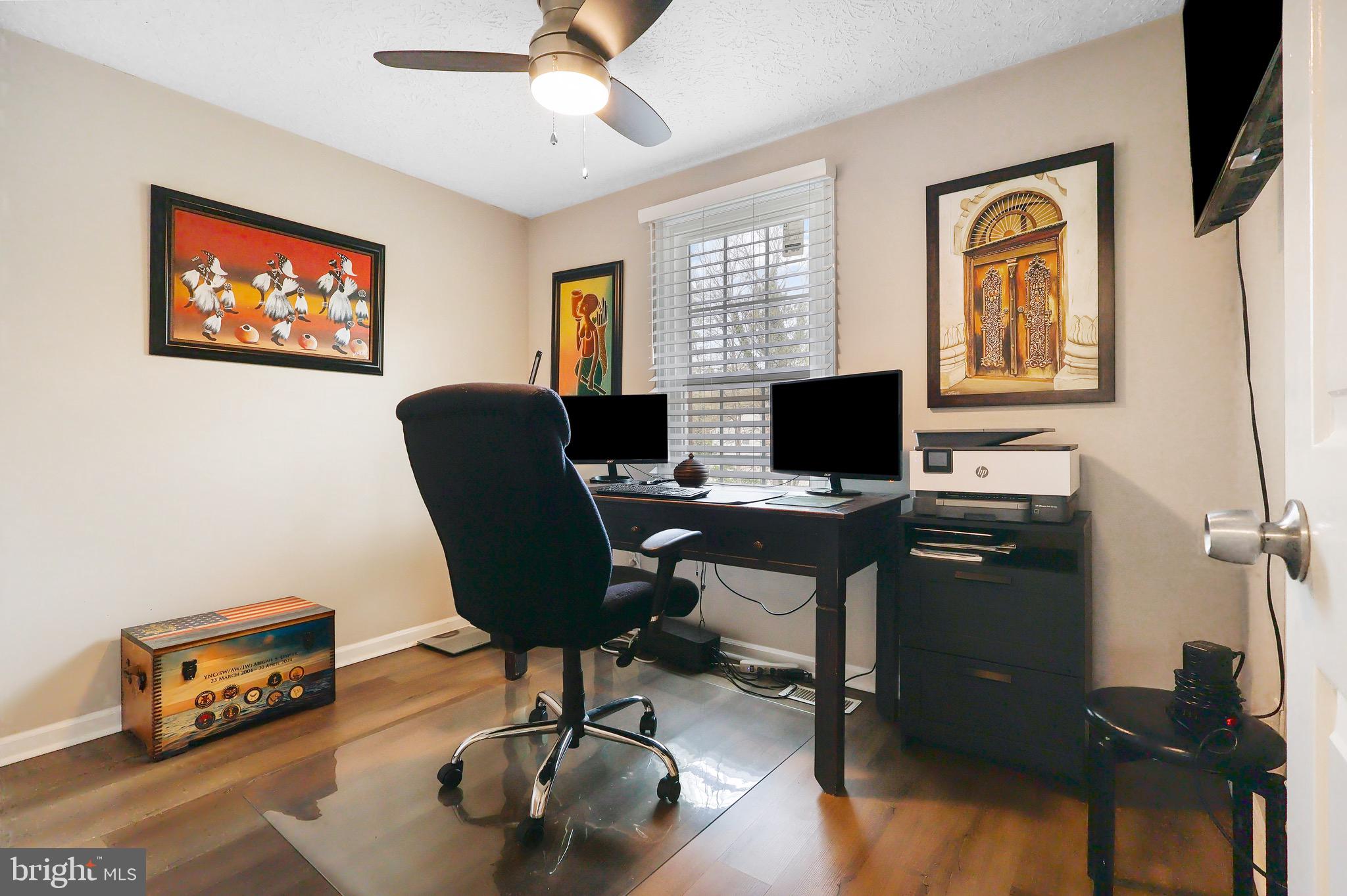 1108 Casper Drive Herndon, VA 20170 - Photo 20 of 24 a view of a workspace with furniture and a window