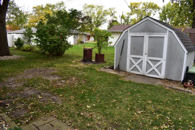 a backyard of a house with lots of green space