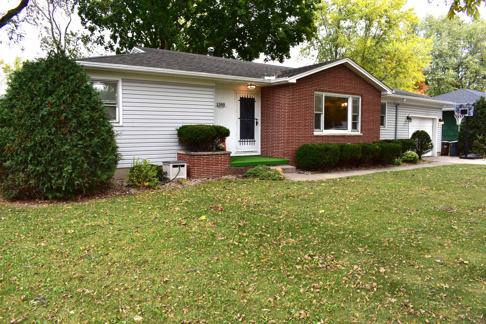 1500 Manhattan Drive Streator, IL 61364 - Photo 24 of 24 a view of a house with a yard and sitting area
