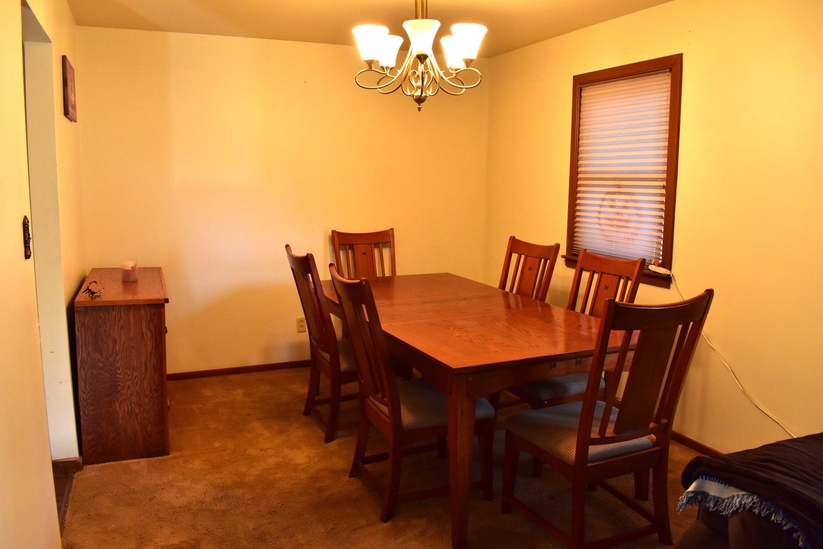 1500 Manhattan Drive Streator, IL 61364 - Photo 5 of 24 a view of a dining room with furniture and wooden floor