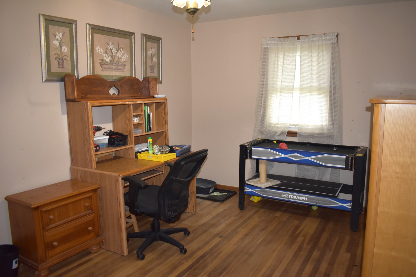 1500 Manhattan Drive Streator, IL 61364 - Photo 10 of 24 a view of a workspace with furniture and a window